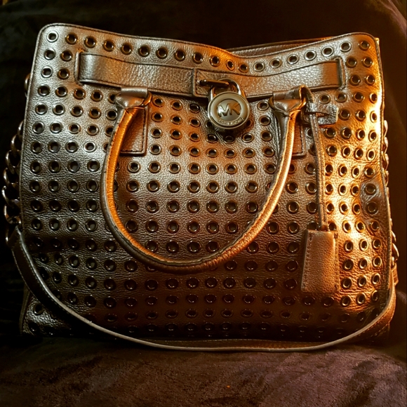 Michael Kors Handbags - Michael Kors Very Unique Large Bag Pewter bag with Gun Metal rivets.